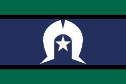 Torres Strait Islander Flag with the green panels at the top and bottom, black lines dividing the panels, a white traditional headdress Dhari at the centre and underneath the Dhari a white five-pointed star.