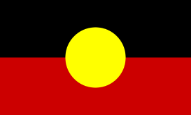 Australian Aboriginal Flag where the top half is black and the lower half is red with a yellow circle in the centre.